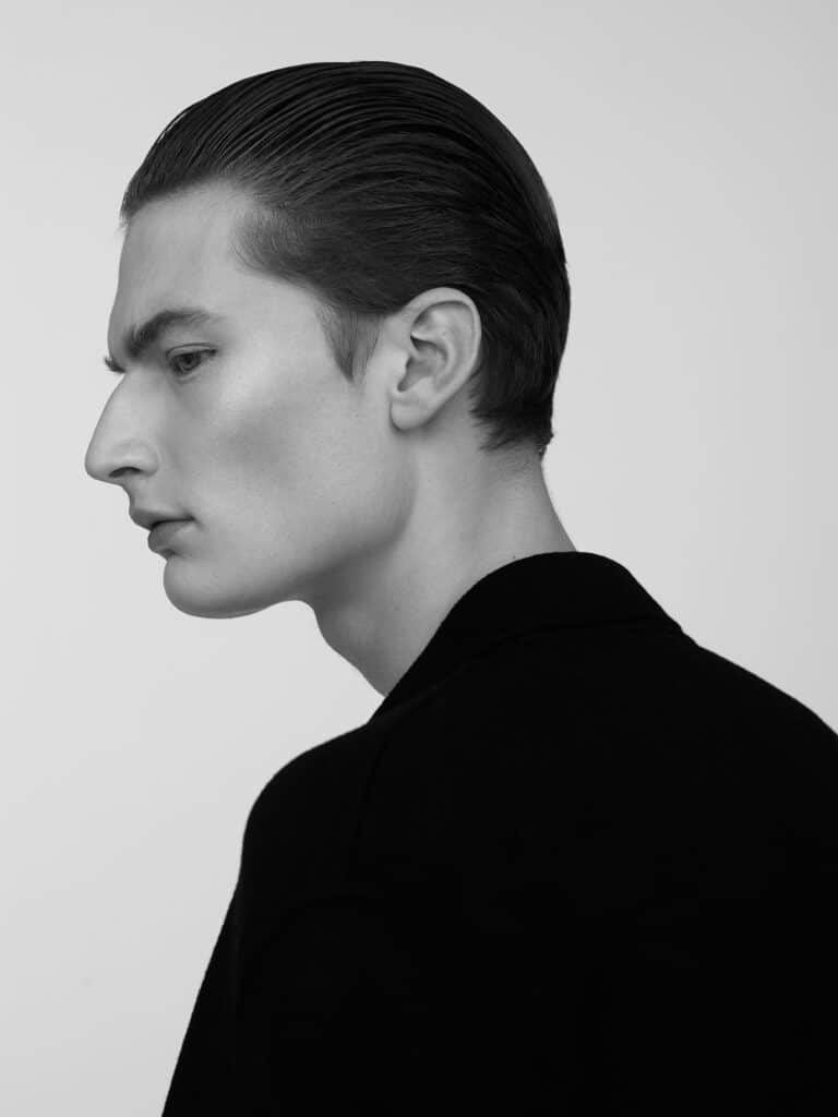 Black and white portrait man profile shot grooming