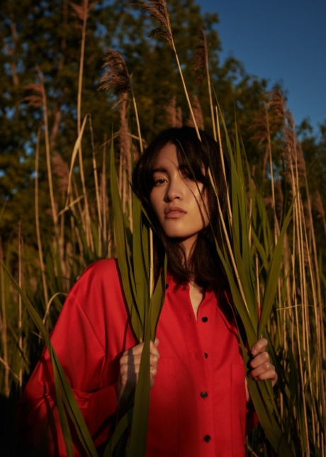 Fashion Editorial Contry side Red shirt model luminous skin