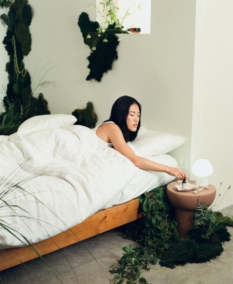 Set design for psyched wellness green moss and flowers installation