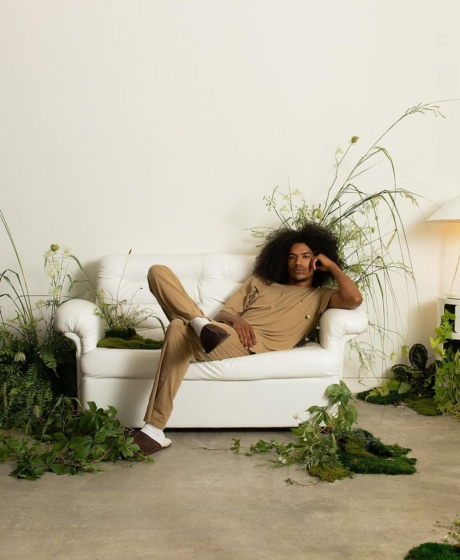 Set design for psyched wellness green moss and flowers installation