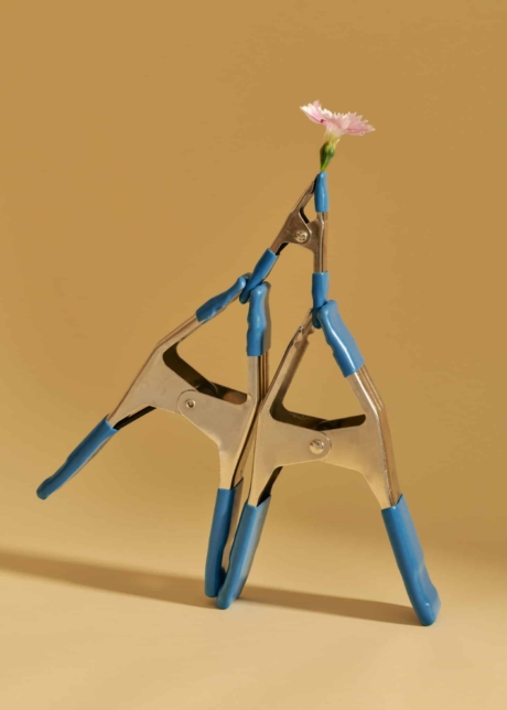 Product styling for Milkys Café Toronto expresso little cup candle milk bottle late and a yellow flower